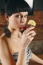 Young woman drinking a martini Royalty Free Stock Photo