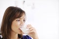 Young woman drinking milk Royalty Free Stock Photo