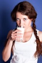 Young woman drinking a milk Royalty Free Stock Photo