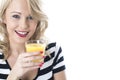 Young Woman Drinking Orange Juice Royalty Free Stock Photo