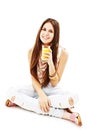 Young woman drinking orange juice smiling happy