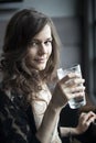 Young Woman Drinking a Pint Glass of Ice Water Royalty Free Stock Photo