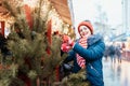 Young woman drinking punch on christmas market Royalty Free Stock Photo