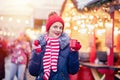 Young woman drinking punch on christmas market Royalty Free Stock Photo