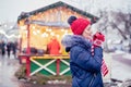 Young woman drinking punch on christmas market Royalty Free Stock Photo