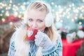 Young woman drinking punch on christmas market Royalty Free Stock Photo