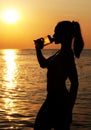 Young Woman Drinking Water After Jogging Royalty Free Stock Photo