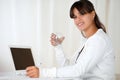 Young woman drinking water at office Royalty Free Stock Photo