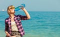 Young woman drinking water outdoor Royalty Free Stock Photo