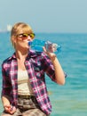 Young woman drinking water outdoor Royalty Free Stock Photo