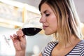 Young woman drinking wine at restaurant Royalty Free Stock Photo