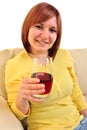 young woman drinks home made juice