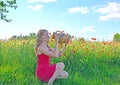 Young woman drinks water from pitcher on hot summer day Royalty Free Stock Photo