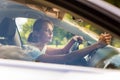 Young woman driving her car Royalty Free Stock Photo