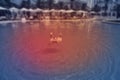 Young woman drowns in empty pool water, tilt shift effect