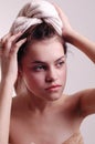 Young woman drying hair with towel Royalty Free Stock Photo