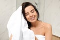 Young woman drying hair with towel Royalty Free Stock Photo