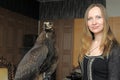 Young woman with an eagle behind Royalty Free Stock Photo