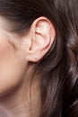 Young woman ear closeup Royalty Free Stock Photo