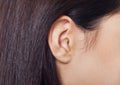 Young woman ear closeup Royalty Free Stock Photo