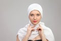 Young woman eastern type in the modern Muslim clothes and beautiful headdress Royalty Free Stock Photo