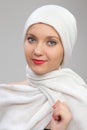 Young woman eastern type in the modern Muslim clothes and beautiful headdress Royalty Free Stock Photo