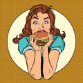 Young woman eating Burger