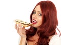 Young Woman Eating Chocolate Spread and Banana on Toast Royalty Free Stock Photo