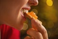 Young woman eating cookie with orange jam Royalty Free Stock Photo