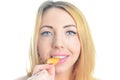 Young woman eating crisps Royalty Free Stock Photo