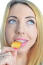 Young woman eating crisps Royalty Free Stock Photo