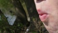 Young woman eating delicous apple strudel, face detail