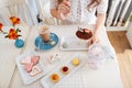 Young woman eating dessert and drinking latte at the table Royalty Free Stock Photo