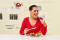 Young woman eating diet salad plate healthy weight loss food Royalty Free Stock Photo