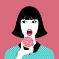 Woman eating donut