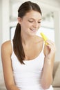 Young Woman Eating Fresh Pineapple Royalty Free Stock Photo