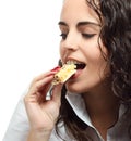 Young woman eating granola bar Royalty Free Stock Photo