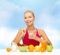 Young woman eating healthy breakfast Royalty Free Stock Photo
