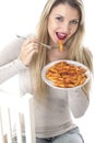 Young Woman Eating Penne Pasta