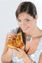 Young woman eating pizza Royalty Free Stock Photo