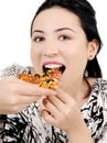 Young woman eating pizza