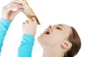 Young woman eating pizza. Royalty Free Stock Photo