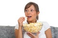 Young woman eating popcorn Royalty Free Stock Photo