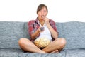 Young woman eating popcorn Royalty Free Stock Photo