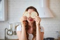 Young woman eating rye cracker crisp bread in the kitchen. Healthy Lifestyle. Health, Beauty, Diet Concept Royalty Free Stock Photo