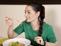 Young woman eating spaghetti Royalty Free Stock Photo