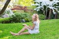 Young woman eating sushi in Japanese park Royalty Free Stock Photo