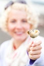 Young Woman Eating a Whelk (bourgot in french)