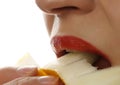 Young woman eats a melon. Happy girl eats a honeydew melon and laughs. healthy food and dieting concept Royalty Free Stock Photo