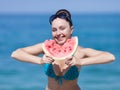 Young woman eats watermelon Royalty Free Stock Photo